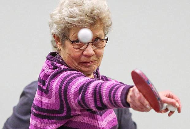 Barbel Naeslund practices for the Reno-Tahoe Senior Winter Games table tennis competition at the Carson City Senior Citizen Center in Carson City, Nev., on Friday, Jan. 29, 2016.