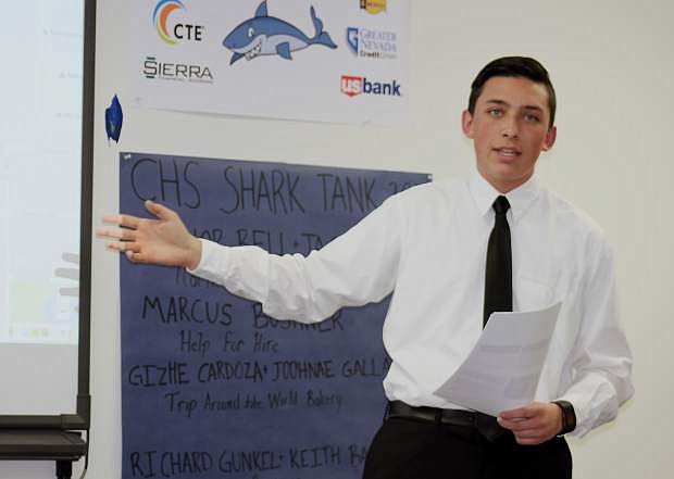 Carson High sophomore Brennan Peterman presents his idea for a high end ski shop to the judges during the Shark Tank compeition Thursday.