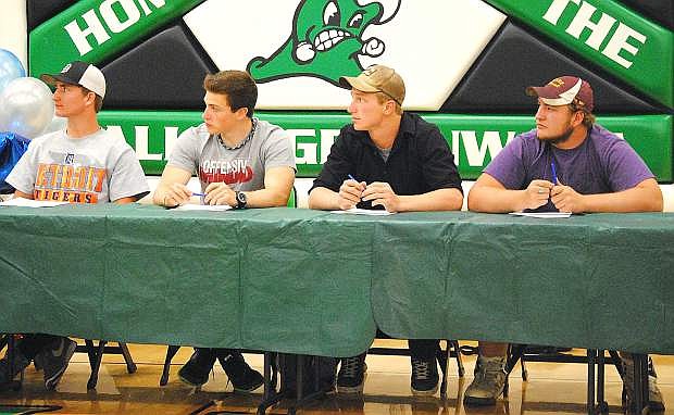 Nine Churchill County High School seniors will continue their athletic careers next fall in college. The athletes took part in a ceremony last week, including from left, Robert White, Trent Tarner, Dakota Schelling and Brendon Lewis.