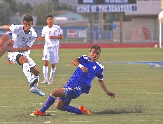Carson&#039;s Guillermo Hernandez scores a goal for the Senators in the first half against Reno at CHS Wednesday evening.