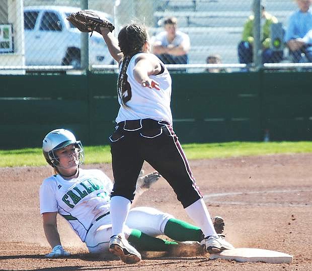 Fallon catcher Megan McCormick slides into second base during the Lady Wave&#039;s 14-4 win over Sparks on Monday.