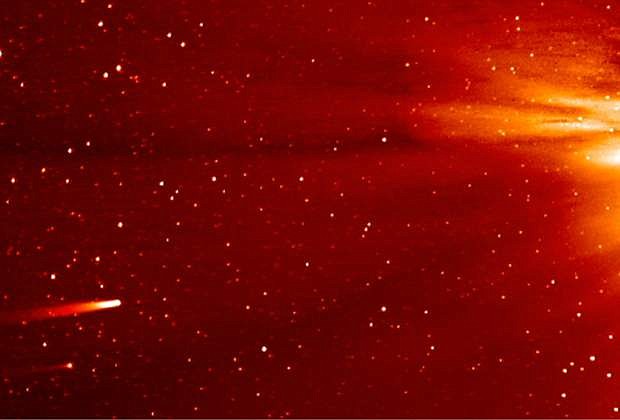 In this frame grab taken from enhanced video made by NASA&#039;s STEREO-A spacecraft, comet ISON, left, approaches the sun on Nov. 25, 2013. Comet Encke is shown just below ISON, The sun is to the right, just outside the frame. ISON, which was discovered a year ago, is making its first spin around the sun and will come the closest to the super-hot solar surface on Thanksgiving Day, Thursday, Nov. 28, 2013, at 1:37 p.m. EST. (AP Photo/NASA)