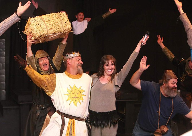Mike Wiencek and Michellle Mauer lead a song and dance routine during a dress rehearsal for &quot;Spamalot&quot; on Monday night.
