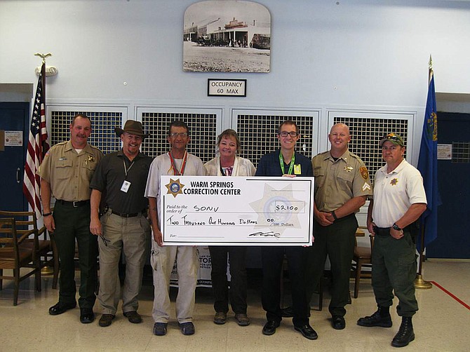 Warm Springs Correctional Center hosed an inaugural golf tournament for Special Olympics which was put on by Officer Tony Cloke and Senior Officer Craig Arnett. Organizers thank local businesses for supporting it and are asking the community to look forward tot he event next year. Seen with a check for $2,100 from the left are Officer Cloke, Warden Wickham, Special Olympian Tyrone, Associate Warden Walsh, Special Olympic coach David, Senior Officer Arnett.