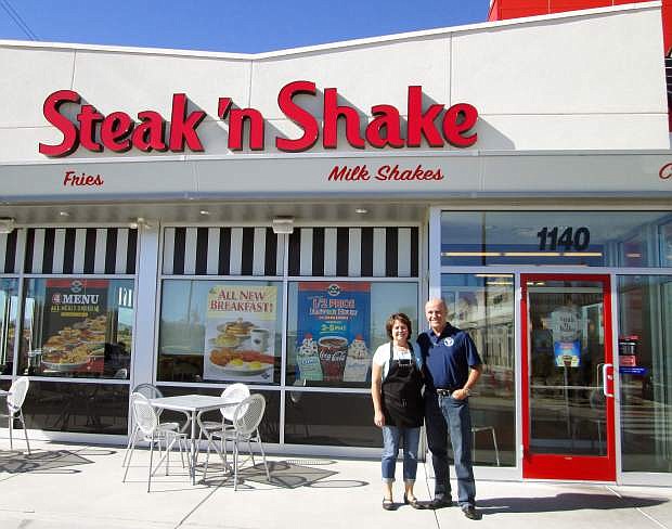 Owners Mayelen Garijo and Eric Vetter stand in front of Reno&#039;s first Stake &#039;n Shake.