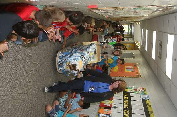 Students at Mark Twain Elementary parcipate in a &quot;state parade&quot; on Friday.