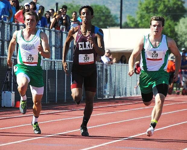 Fallon sprinters Jake Ernst, left, and Trent Tarner, right, head toward the finish line of the 100-meter race at the Division I-A state track meet Friday at Carson High School. Tarner finished fourth, while Ernst took seventh.