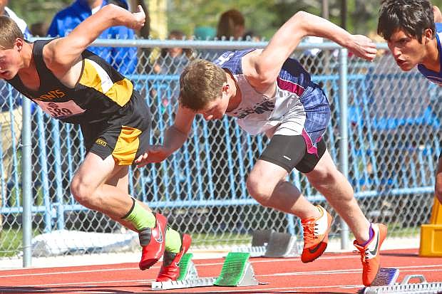 Sierra Lutheran&#039;s Grant Goins explodes out of the blocks during the Div. IV 100-meter sprint Saturday.