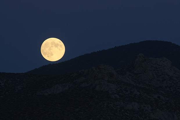 A Supermoon rises over south Carson City on Monday night.