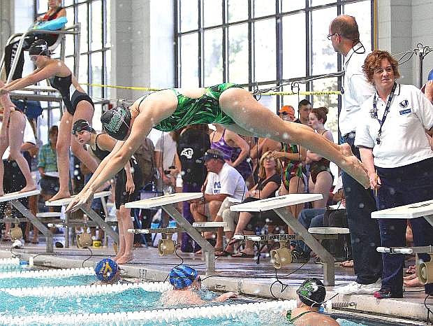Fallon sophomore Kaelehn Nemeth dives into the water during the 200-yard freestyle relay on Saturday at the Northern Division I-A regional meet in Carson City. The relay team placed third to qualify for this week&#039;s state meet.