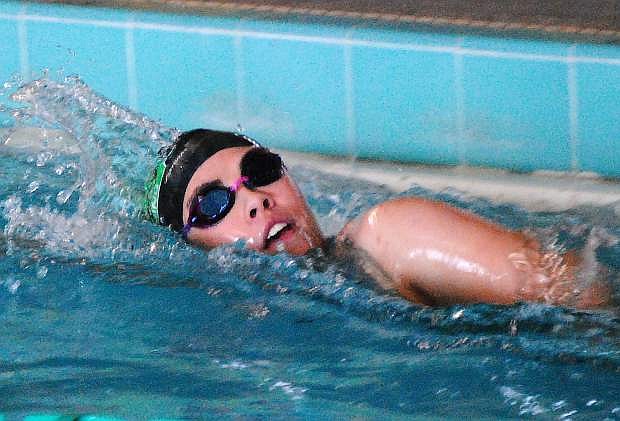 Sophomore Sierra Bivens warms up during practice.