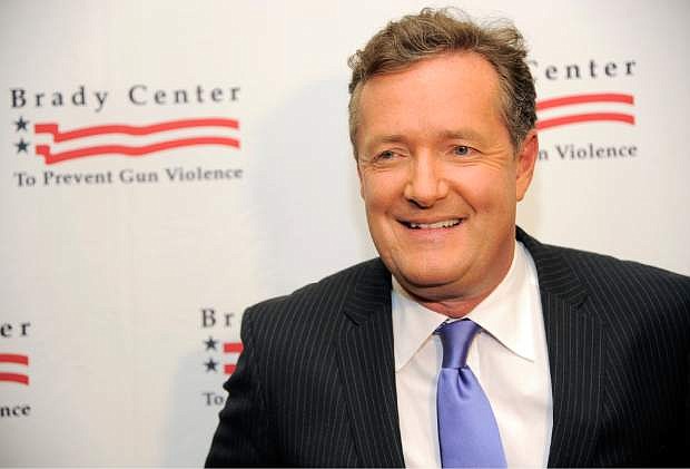 FILE - In this May 7, 2013, file photo, honoree Piers Morgan poses at the Brady Campaign to Prevent Gun Violence Los Angeles Gala at The Beverly Hills Hotel in Beverly Hills, Calif. CNN said Sunday, Feb. 23, 2014, that the prime-time talk show &quot;Piers Morgan Live&quot; is coming to an end and that the show&#039;s final airdate has yet to be determined. (Photo by Chris Pizzello/Invision/AP, File)