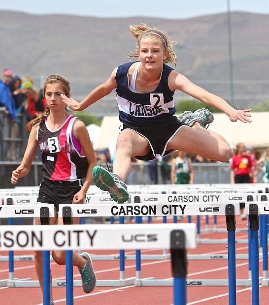 Carson Middle School 7th grader Hannah Kaiser runs the 80-meter hurdles with a time of 16.03 Wednesday afternoon at the Tah-Neva Track and Field Championships at Carson High.