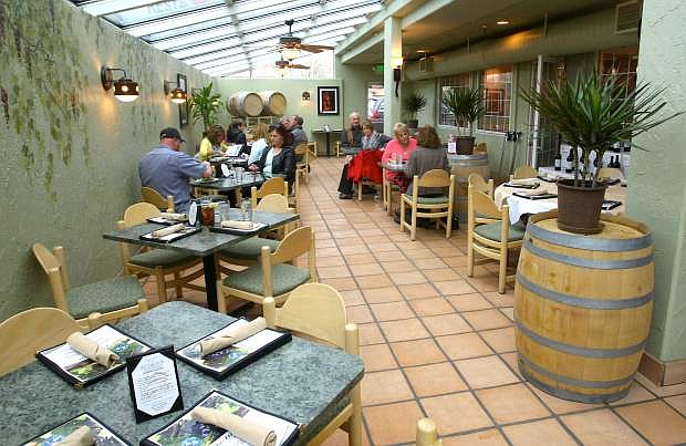 Customers enjoy lunch on the patio during the soft opening of The Bistro at Tahoe Ridge Winery on Tuesday.