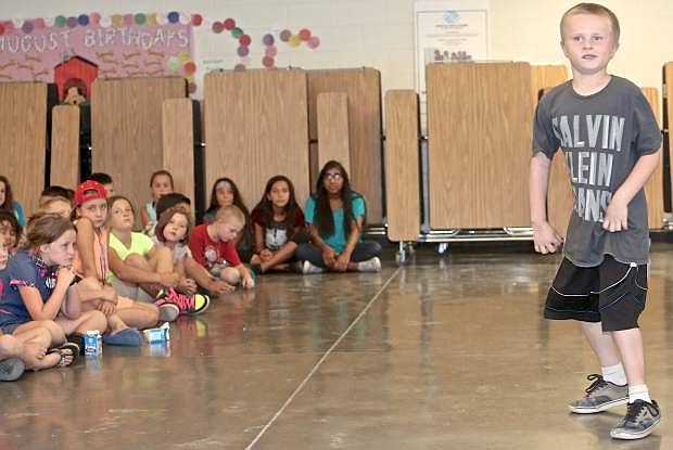 7-year-old Jacob Blandford dances for the audience Friday at the Boys &amp; Girls Club.