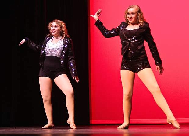Caitlyn Lee and Laney Kenison sing and dance to &#039;I Am A Good Girl&#039; Wednesday night at the CHS Talent Show.