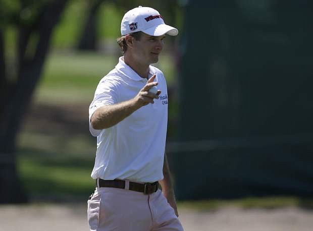 Kevin Streelman reacts after making a birdie putt on the 17th hole during the third round of the Tampa Bay Championship golf tournament on Saturday, March 16, 2013, in Palm Harbor, Fla. (AP Photo/Chris O&#039;Meara)