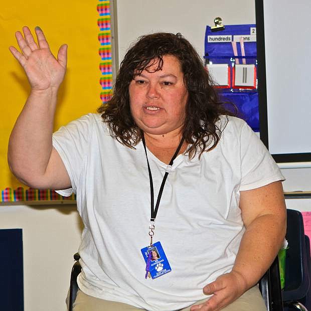 Dayton Elementary teacher Tammy Borremans received a $2,000 grant for her innovative teaching idea, Make it a HabiTat. She is now eligible to compete for a grant of up to $25,000. She is shown here in her classroom Thursday during a presentation by a Marine Corps veteran.