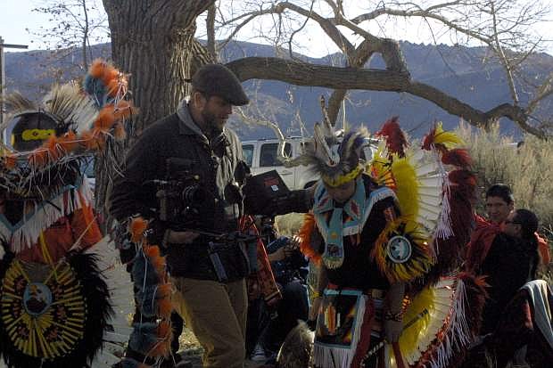 American Indian fancy dancers Ben and John Rupert, from left, perform Sunday in Riverview Park in a commercial for the Nevada Commission on Tourism. The commercial is featuring a variety of highlights from around the state.