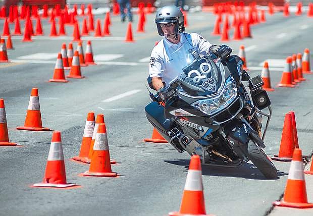 Loren Hilliard from Boise City Police Department competes in last year&#039;s Extreme Motor Officer Challenge  in  2013. A new Nevada Commission on Tourism grant will help the Carson City Visitors Bureau expand on this popular event by promoting the Battle Born Brew Fest and a roller derby &amp; tattoo contest the same weekend.