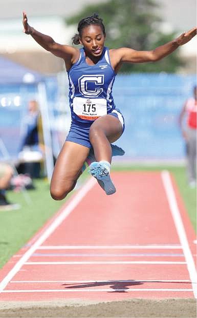 Carson&#039;s Maddie Preston jumps at the 2014 State Finals.