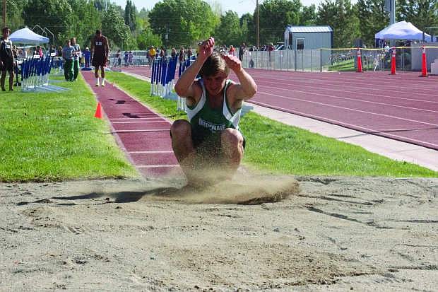 Fallon&#039;s Jake Ernst lands in the pit during the long jump at the Northern Division I-A regional track meet last week.