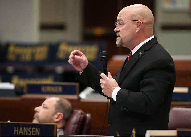 In this April 21, 2015, photo, Nevada Assemblyman Ira Hansen, R-Sparks, speaks during Assembly floor debate about a bill that would require transgender students to use school facilities based on their biological gender, in Carson City, Nev., on Tuesday, April 21, 2015. The Nevada Assembly rejected the bill that outraged transgender advocates. (AP Photo/Cathleen Allison)