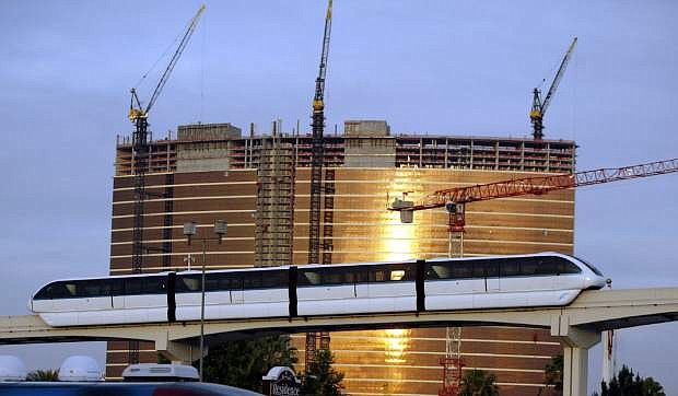 The  Las Vegas Monorail passes the under-construction Wynn Las Vegas hotel and casino in Las Vegas. Transportation leaders in southern Nevada who are considering multiple changes that could cost $7 billion to $12 billion to make it easier for visitors to get around the gambling destination.