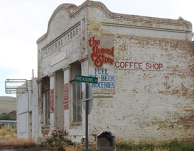 An old, empty general merchandise store sits two blocks east of the courthouse.