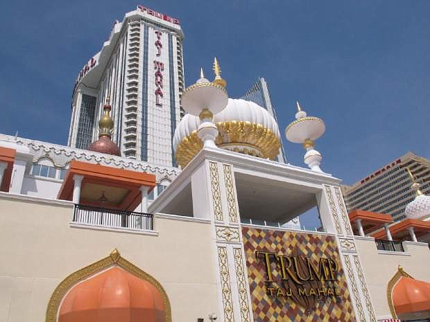 This April 8, 2013 photo shows the Trump Taj Mahal Casino Resort, in Atlantic City N.J.  Internet gambling isn&#039;t expected to start in New Jersey until around Thanksgiving, but Atlantic City&#039;s 12 casinos must move fast to line up partners for their online operations. The state Gaming Enforcement Division has told the casinos they have until June 30 to arrange Internet gambling deals.  (AP Photo/Wayne Parry)