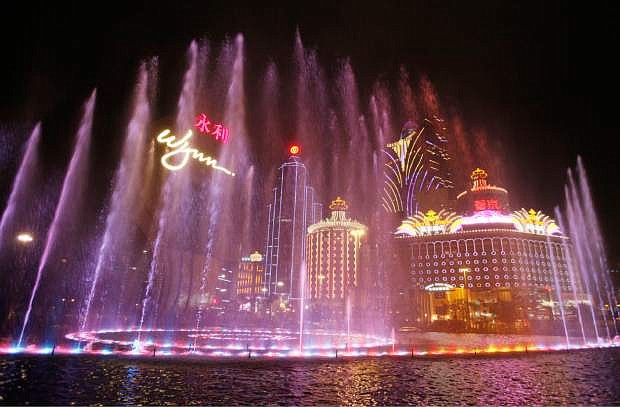 In this April 22, 2010 photo, Music fountain performs at the Wynn Macau. Macau is in the midst of one of the greatest gambling booms the world has ever known. To rival it, Las Vegas would have to attract six times as many visitors essentially every man, woman and child in America. Wynn Las Vegas now makes nearly three-quarters of its profits in Macau. Sands, which owns the Venetian and Palazzo, earns two-thirds of its revenue there. (AP Photo/Kin Cheung)