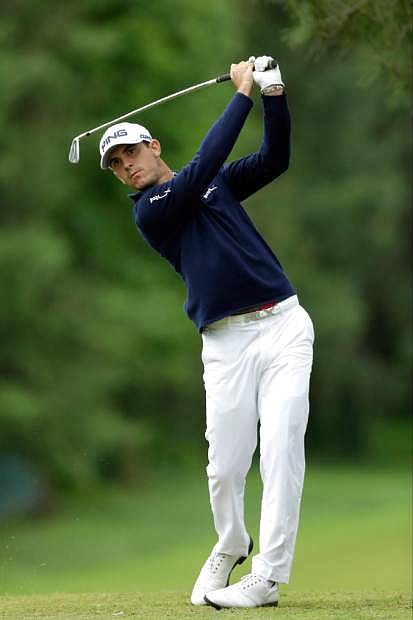 Billy Horschel tees off on the eighth hole during the first round of the U.S. Open golf tournament at Merion Golf Club, Friday, June 14, 2013, in Ardmore, Pa. (AP Photo/Julio Cortez)