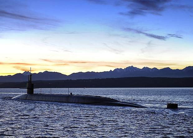 The USS Nevada leaves Puget Sound Friday morning on its way to its homeport, Naval Base Kitsap-Bangor.