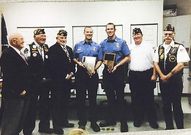 Members of Veterans of Foreign Wars Post 8660 present awards to Lyon County Fire District emergency responders.