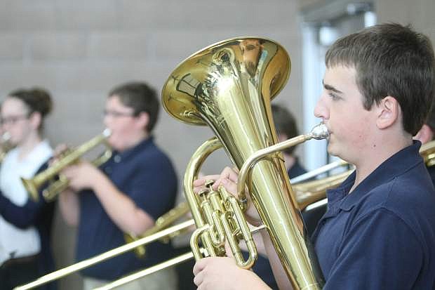 The Carson Middle School band performs &#039;You&#039;re a Grand ol&#039; Flag&#039; and &#039;Battle Hymn of the Republic&#039; on Thursday at the school during the veterans tribute concert.
