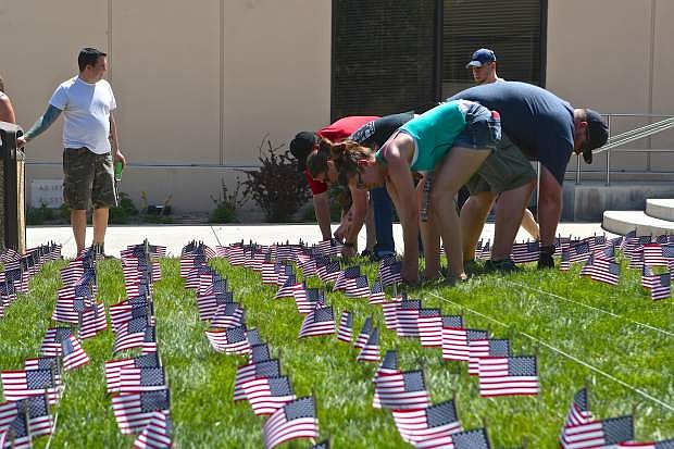 WNC students plant flags Friday in remembrance of veterans who have ended their lives by suicide.