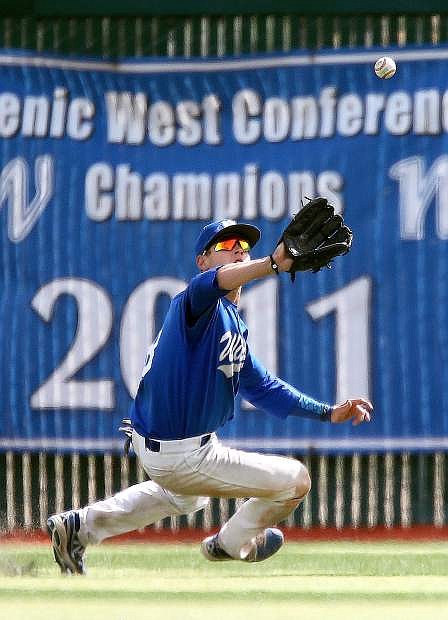 Western Nevada College&#039;s Joey Crunkilton makes a catch against the College of Southern Nevada during a game at John L. Harvey field on Sunday in Carson City.