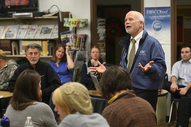 John Kinkella, dean of student services at Western Nevada College, talks to Dayton High School students and parents on Thursday evening.