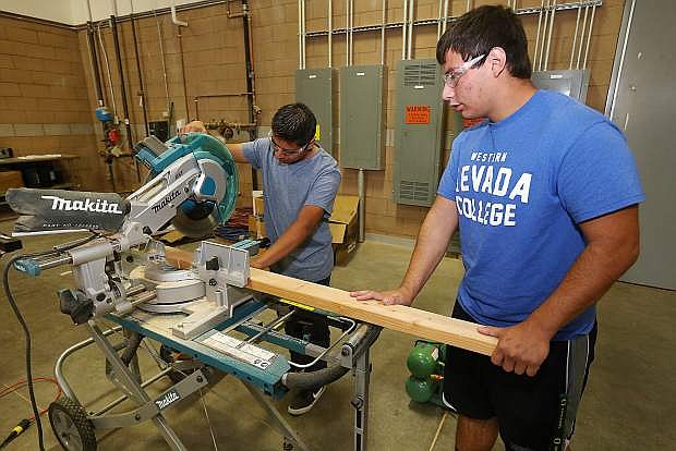 Abram Ramirez, 19, left, and Chris Miranda, 18, work in the construction lab during the Career and Technical Education Open House event at Western Nevada College in Carson City.