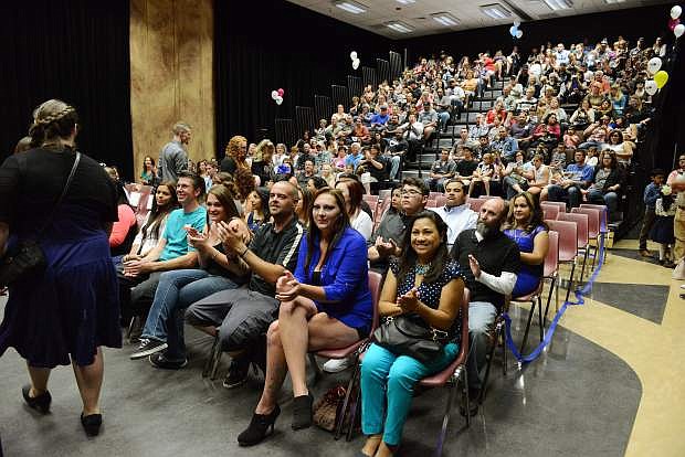Students applaud their comrades as they file in for Friday evening&#039;s Western Nevada College Adult Literacy and Language graduation ceremony in Aspen Building.