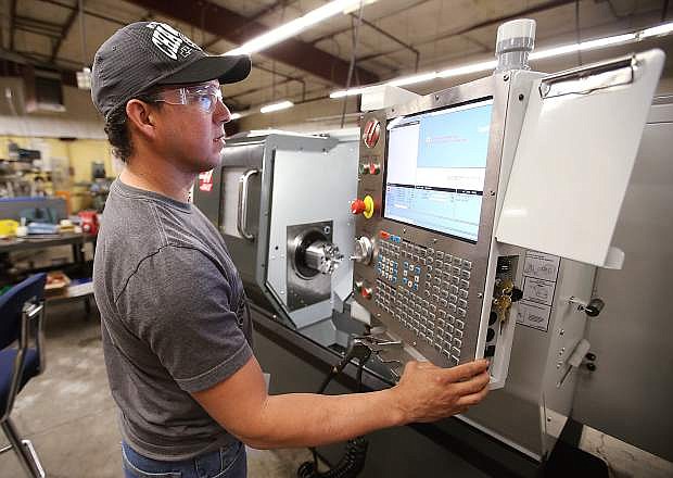 Students work in a machine tool class at Western Nevada College in Carson City.