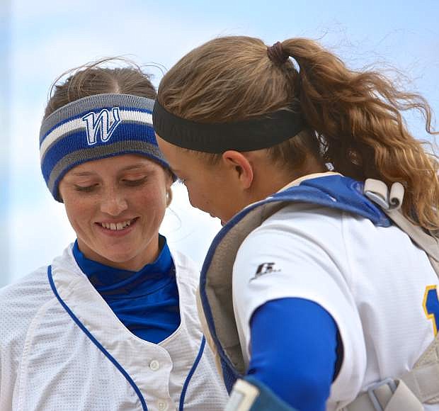 Pitcher Kristina George shares a moment with catcher Bailey Henderson Saturday following WNC&#039;s final home game April 30. George was named to the all-SWAC first team and Henderson was a second team choice.
