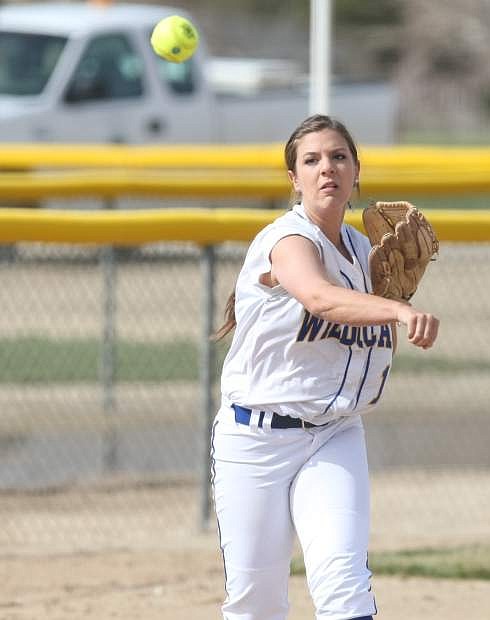 Lindsey Ashbaugh throws from third.