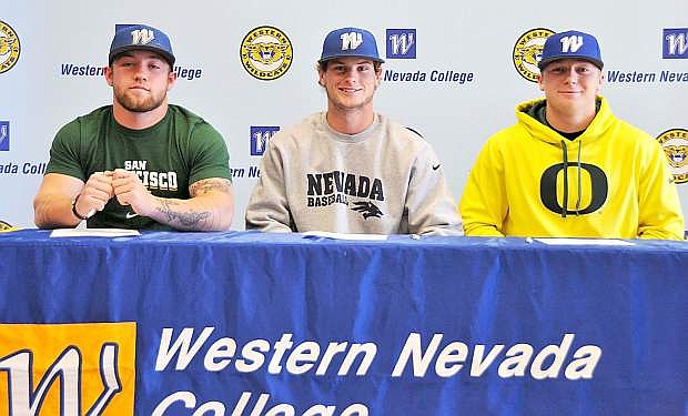 From left, Jack Hall, Christian Stolo and Conor Harber signed letters of intent to play at Division I baseball programs next year.