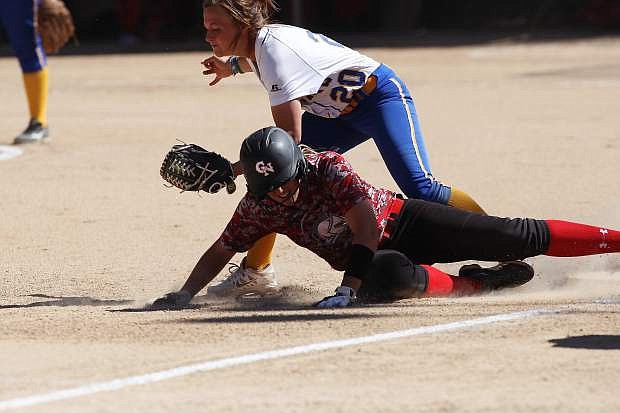 Makaylee Jaussi applies a tag for the Western Nevada College softball team during last season.