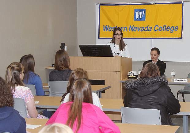 Dr. Kathleen Hood tells local students how she entered denistry at an Inspring Women&#039;s Luncheon hosted by WNC Fallon on Wednesday .