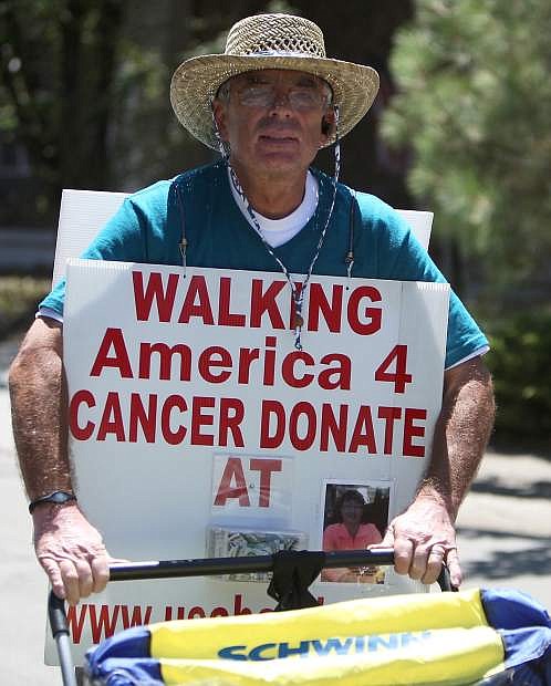 Mike Warren, who is walking across American in support of cancer research and education, made his way through South Lake Tahoe on Tuesday. He was set to be in Carson City on Wednesday night.