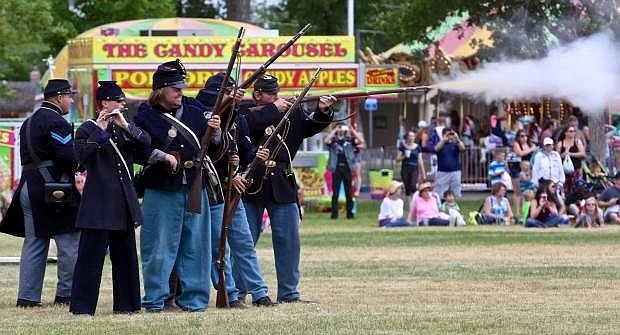 Union soldiers from the 2nd US Light Artillery fire on the Confederates Saturday at Mills Park.