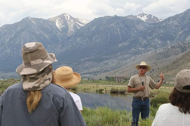 Standing on the bank of the Brockliss slough, rancher J.B. Lekumberry describes the partnership between Ranch No, 1 and The Nature Conservancy&#039;s River Fork Ranch to attendees of a watershed tour on Tuesday.