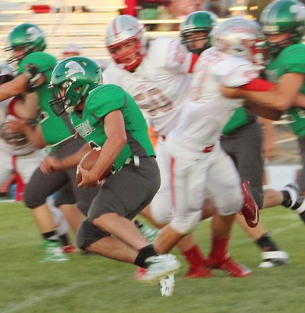 Greenwave running back Brock Uptain (6) rushed for 90 yards on Friday against Truckee. Uptain and the Wave travel to Wooster today.